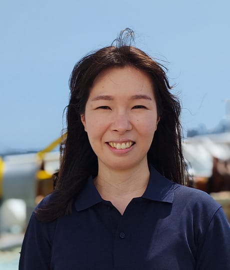 塚田　芳